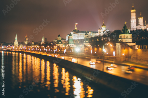 View from Moskvoretsky bridge at Kremlin at night photo