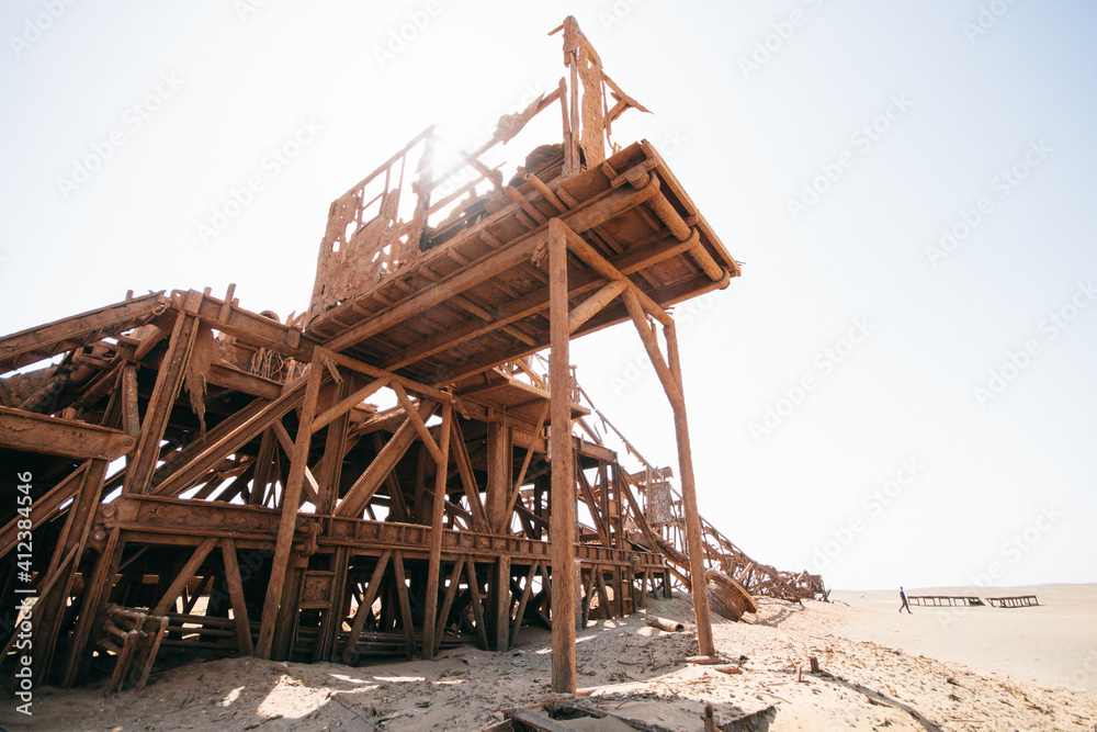 Old ruined rusty structure of an abandoned oil drilling rig in Namibia Old ruined rusty structure of an abandoned oil drilling rig in Namibia