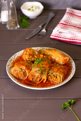 Cabbage rolls with meat, rice and vegetables. Chou farci, dolma, sarma, golubtsi or golabki