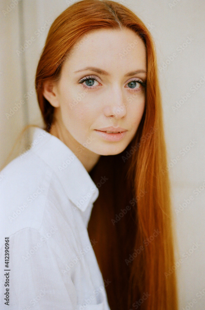 Analog portrait of beautiful woman looking at camera Analog portrait of beautiful woman looking at camera