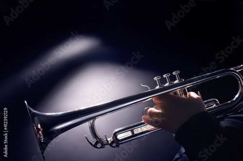 Trumpet player playing jazz music instrument