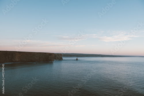 Poruguese shore after sun set photo