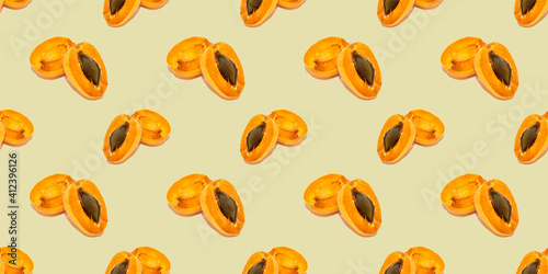Fototapeta Naklejka Na Ścianę i Meble -  Beautiful seamless pattern with apricots, can be used as a packaging for fruits.