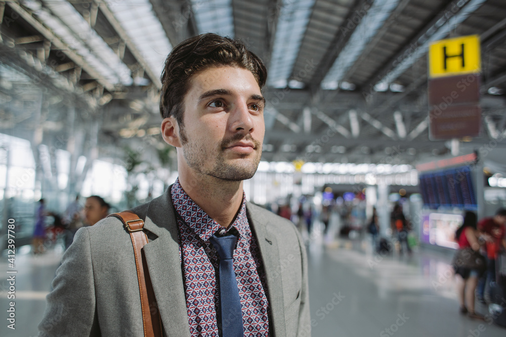 custom made wallpaper toronto digitalYoung entrepreneur waiting at the airport alone