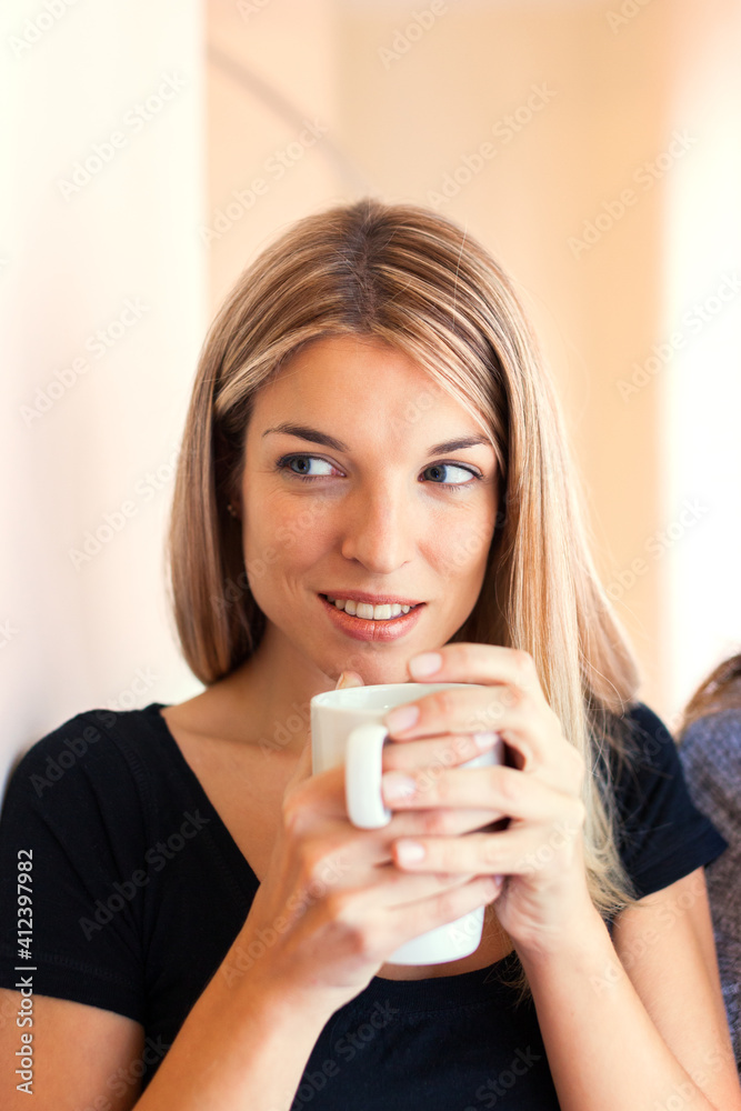 Cute Young Woman Having a Coffee Cute Young Woman Having a Coffee