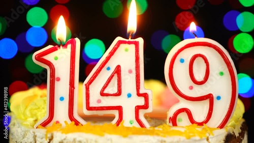 Number 149 Happy Birthday Cake With Burning Candles Topper. photo