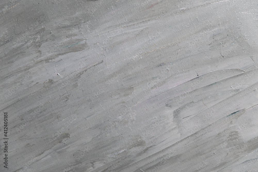 Fototapeta premium abstract gray background from smudged mixed color oil paint on linen canvas
