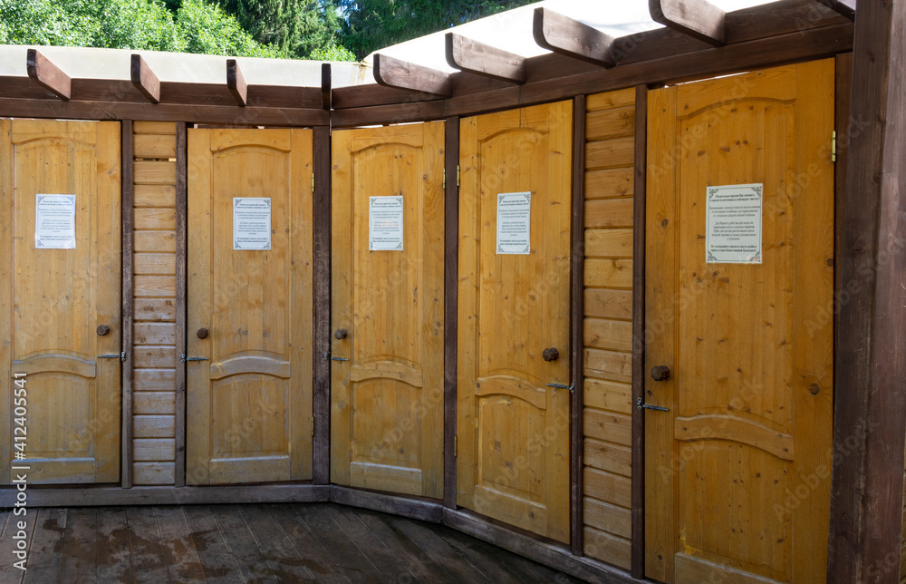  Wooden booths on the territory of the Okovetsky holy spring. The Holy key. Okovetsky holy spring. Okovtsy, Selizharovsky district, Tver region, Russia.  