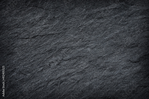 Dark black slate abstract background or texture.
