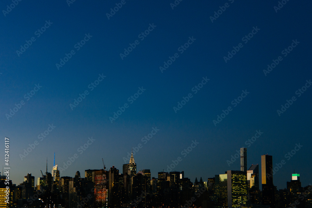 Midtown Manhattan skyline at night. New York City. Midtown Manhattan skyline at night. New York City.