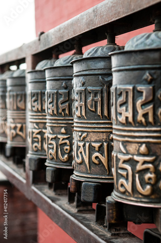 Pray wheels, Monkey Temple (Swayambhunath Stupa), Kathmandu Nepal. photo