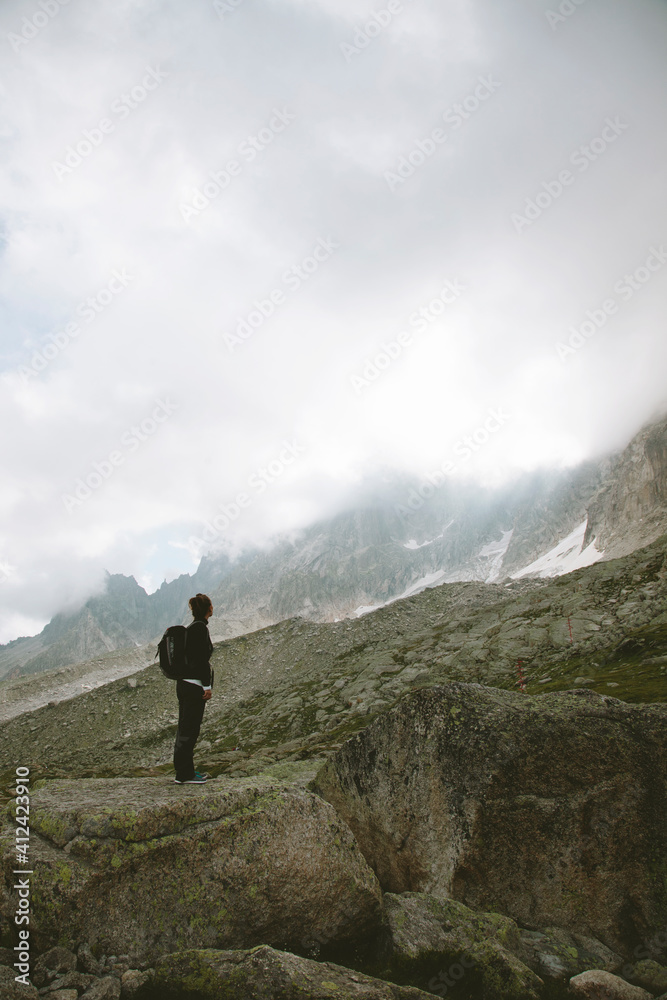 Woman standing on mountain landscape. France. Woman standing on mountain landscape. France.