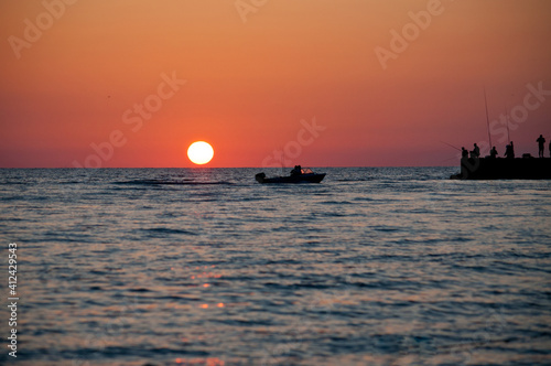 Sunset over the sea photo