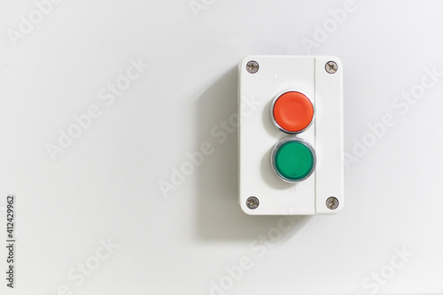 Electric on - off switch on a wall photo