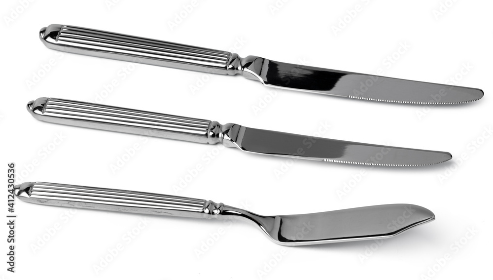 Set of silver dining knives isolated on white Set of silver dining knives isolated on white