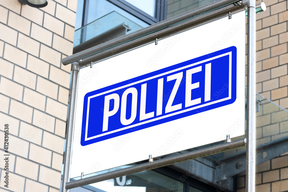 Schild an einer Polizei Wache Schild an einer Polizei Wache