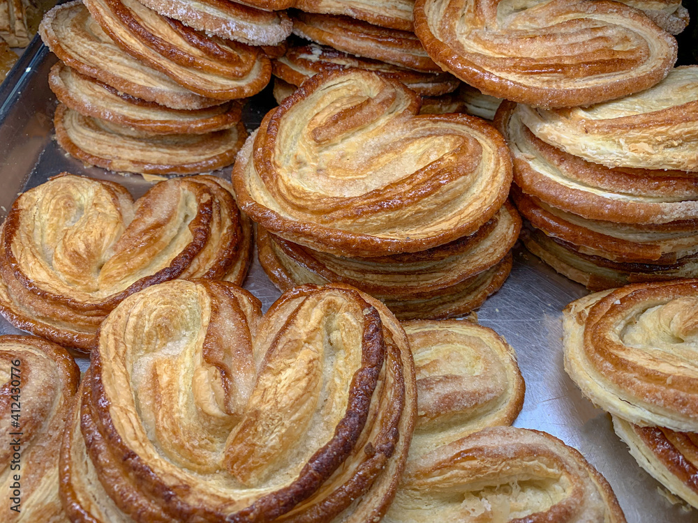 Pan dulce, traditional Mexican pastries known as orejas (ears). Stock