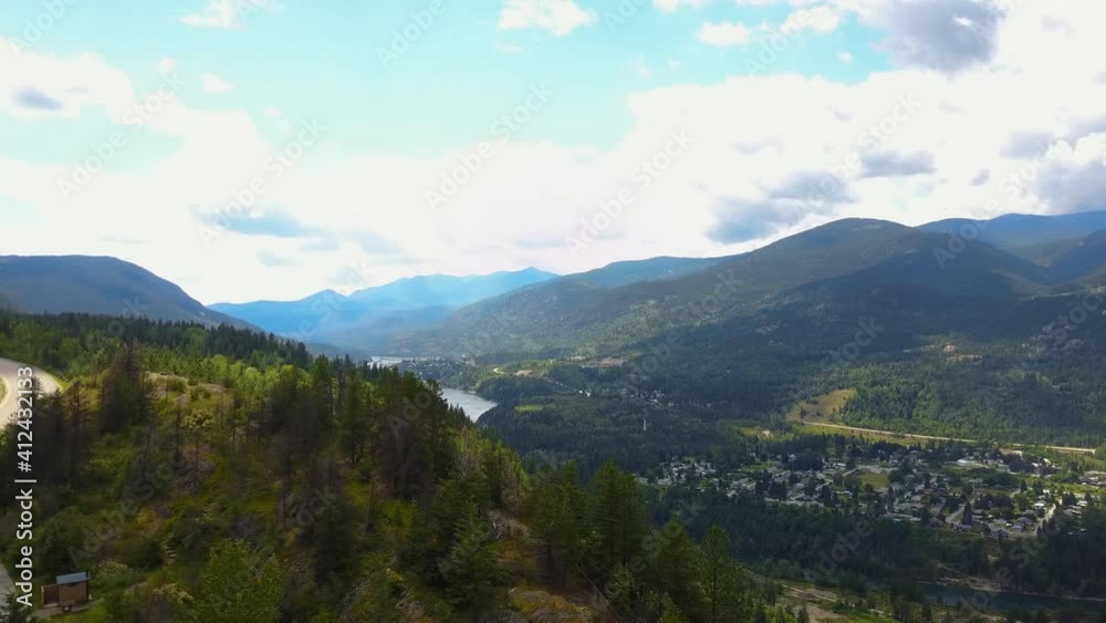 Landscape of cloudy mountain and a lot of tree all around. Panorama of the beautiful nature. Peaceful view of forest, river, and mountains Landscape of cloudy mountain and a lot of tree all around. Panorama of the beautiful nature. Peaceful view of forest, river, and mountains