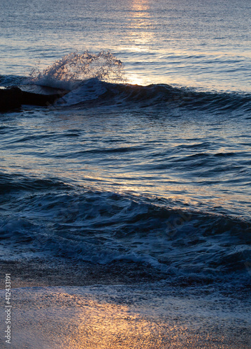 Sea Waves splash with sunlight