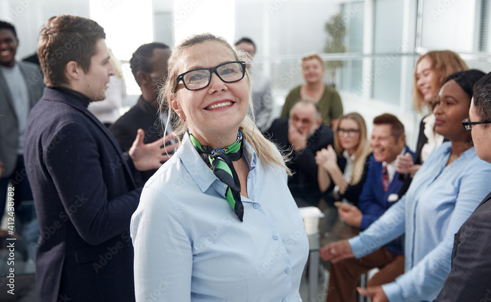 Mature female businesswoman on the meeting in the office Mature female businesswoman on the meeting in the office