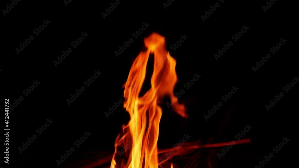 Micro shot of fire flames in night,  View of flames with black background