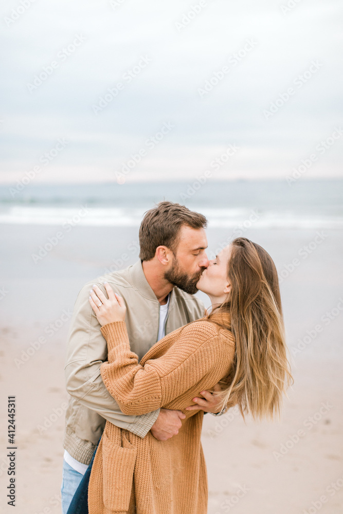 Engagement proposal at beach in Playa Del Rey, California Young Couple