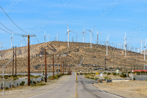 Wallpaper Mural Long straight road with windmills background at California, USA. Torontodigital.ca