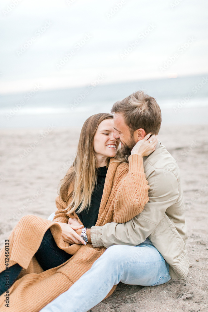 Engagement proposal at beach in Playa Del Rey, California Young Couple