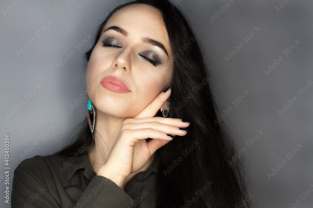 Beautiful young model, longhair girl with bright make-up, red lips