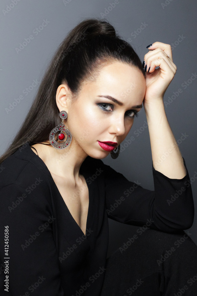 Beautiful young model, longhair girl with bright make-up, red lips