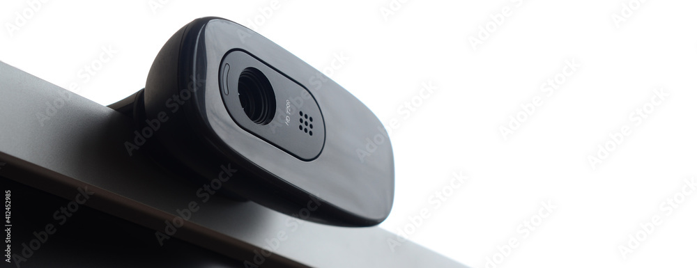 Close-up Of Webcam On Monitor Against White Background - obrazy, fototapety, plakaty 