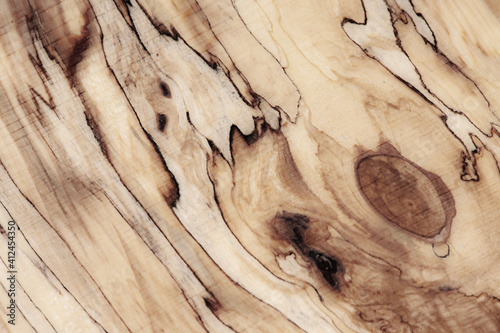 Wood texture Abstract texture. Longitudinal cut birch gnarl (burl,growth, knag, knot) photo