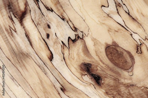 Wood texture Abstract texture. Longitudinal cut birch gnarl (burl,growth, knag, knot)