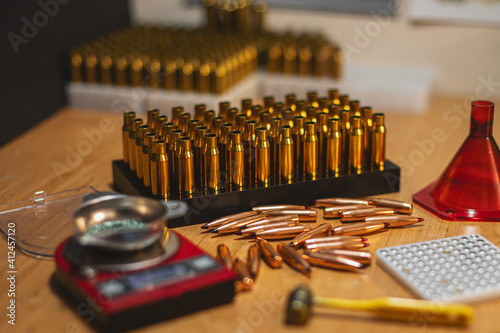 Preparing for reloading, main focus on ballistic point bullets, soft focus photo