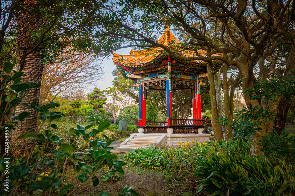 Japan. The temples on the island of Fujisawa. Colorful Japanese gazebo in the Park. Kanagawa Prefecture. Cult Japanese buildings on the island in Fujisawa. Traditional Japanese architecture. Japan. The temples on the island of Fujisawa. Colorful Japanese gazebo in the Park. Kanagawa Prefecture. Cult Japanese buildings on the island in Fujisawa. Traditional Japanese architecture.