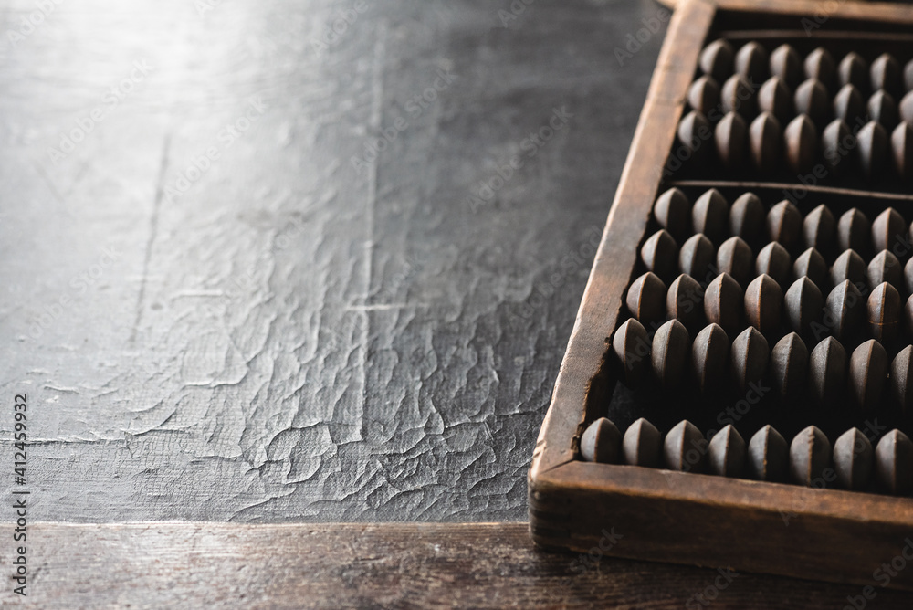 Old arithmetic abacus on the desk top view background with copy space. Old arithmetic abacus on the desk top view background with copy space.