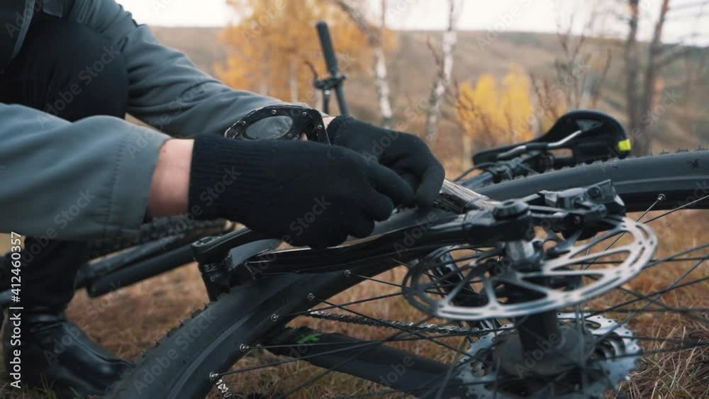 Fixing the pedal of a mountain bike. Close-up. Fixing the pedal of a mountain bike. Close-up.
