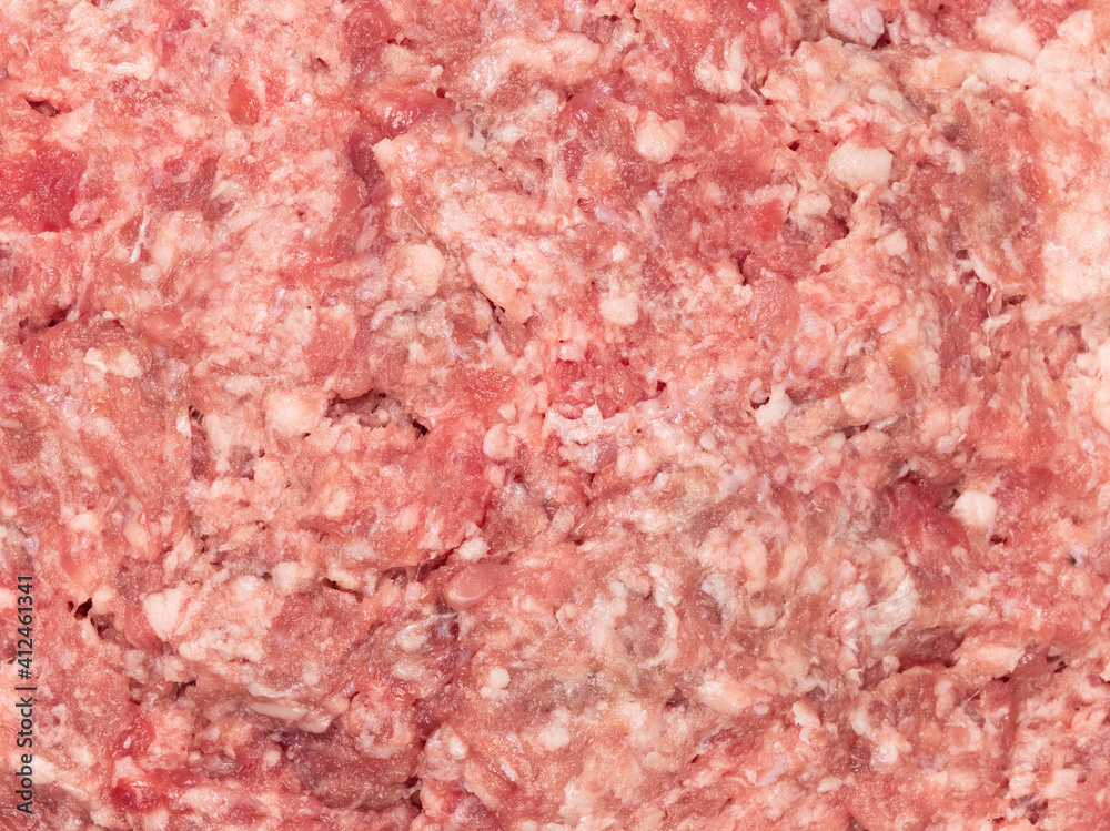 Raw minced meat texture background. Chopped meat background. fresh raw ground pork heap. Top view. Raw minced meat texture background. Chopped meat background. fresh raw ground pork heap. Top view.