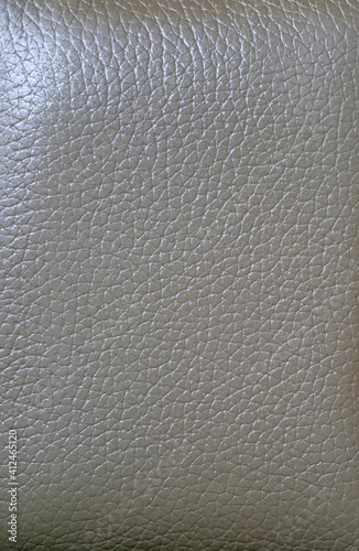 Vertical image of metallic gray colored cow leather texture for abstract background 