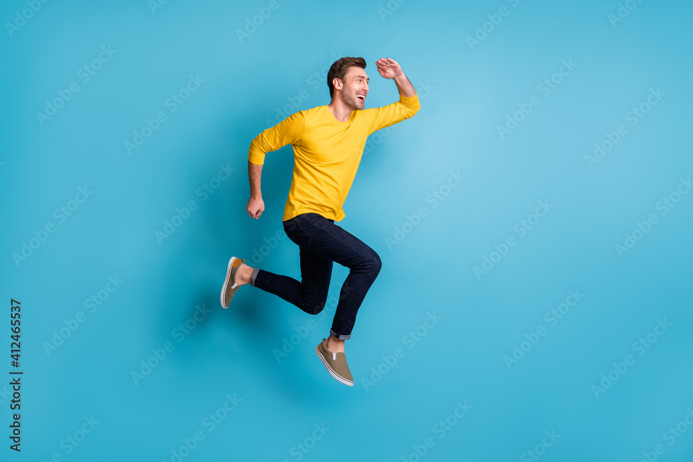 Full size profile portrait of cheerful guy hand near forehead look empty space isolated on blue color background