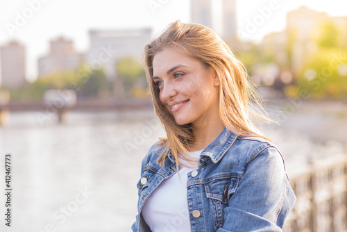 Portrait of a young happy and pretty blonde girl