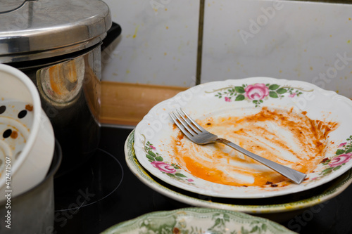 Dirty dishes on the electric stove