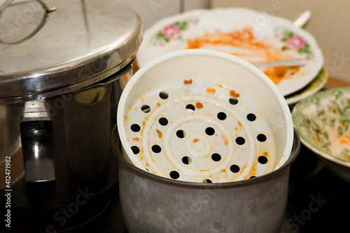 Dirty dishes on the electric stove