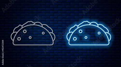 Glowing neon line Taco with tortilla icon isolated on brick wall background. Traditional mexican fast food menu. Vector.