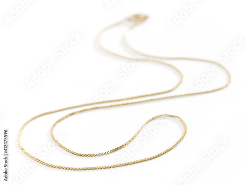 gold chain on white background