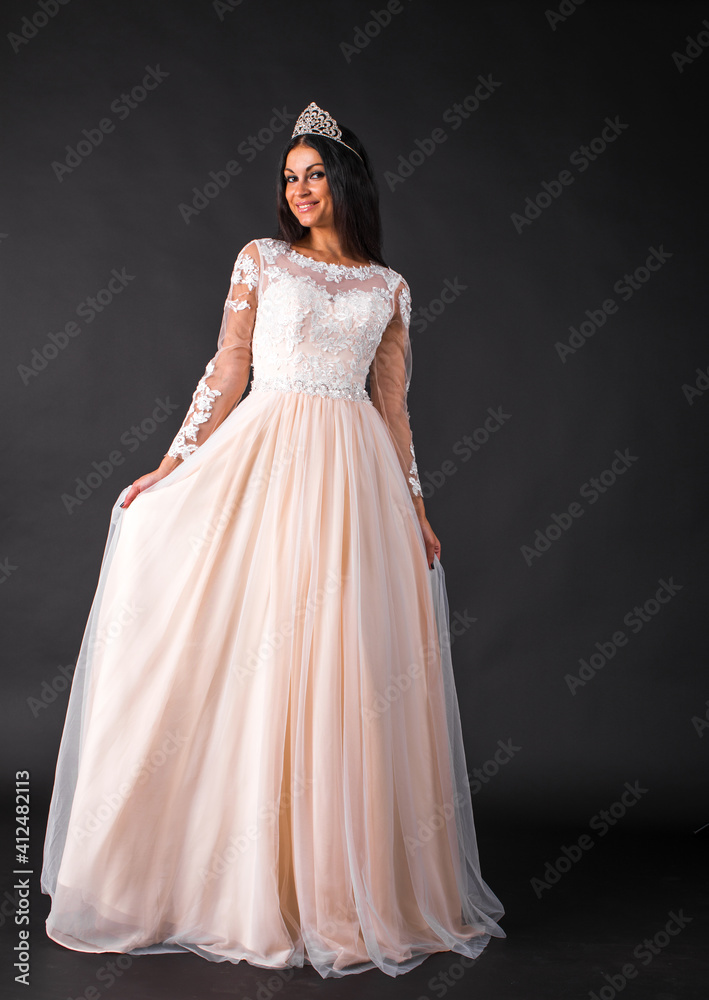 Portrait of young beautiful woman in long dress Portrait of young beautiful woman in long dress