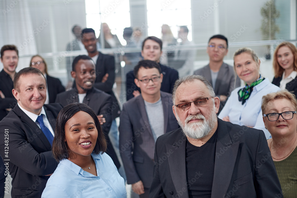 Group of business people with businessman leader on foreground