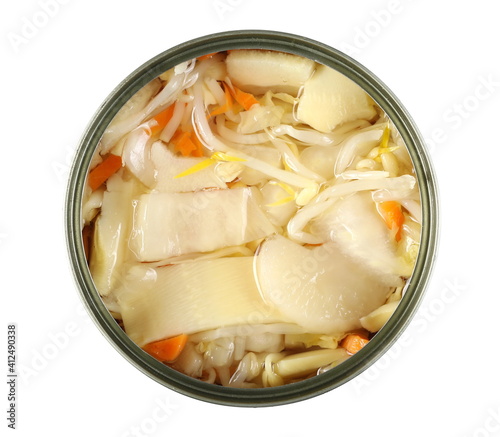 Chinese mix, meal with mungo bean germs, bamboo shoot, cabbage and water chestnuts conserved in open tin can, top view