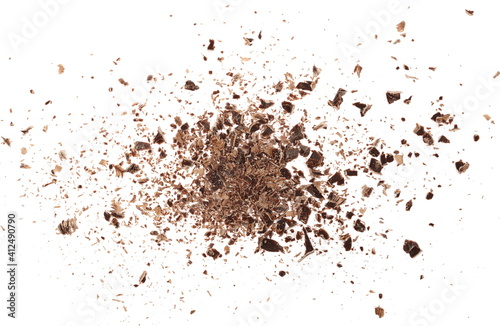 Chocolate shavings, grated flakes pile isolated on white background, top view