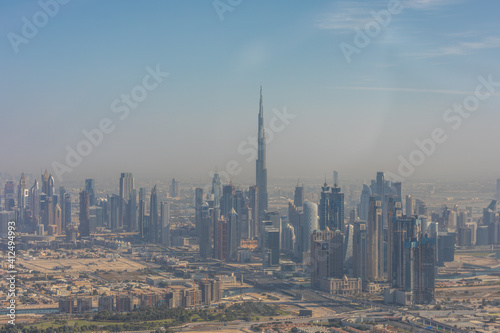 DUBAI, UAE - December, 2020: Aerial view from helicopter of the Dubai skyline, United Arab Emirates